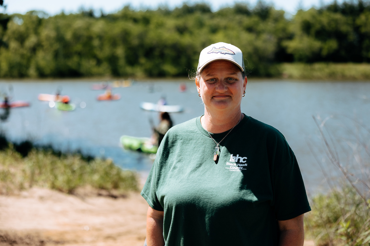 Alumna Amy Davison with group at Big Woods Lake