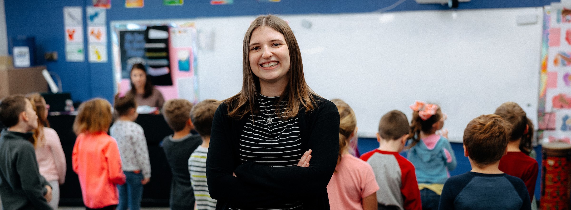 Music education student teacher in class