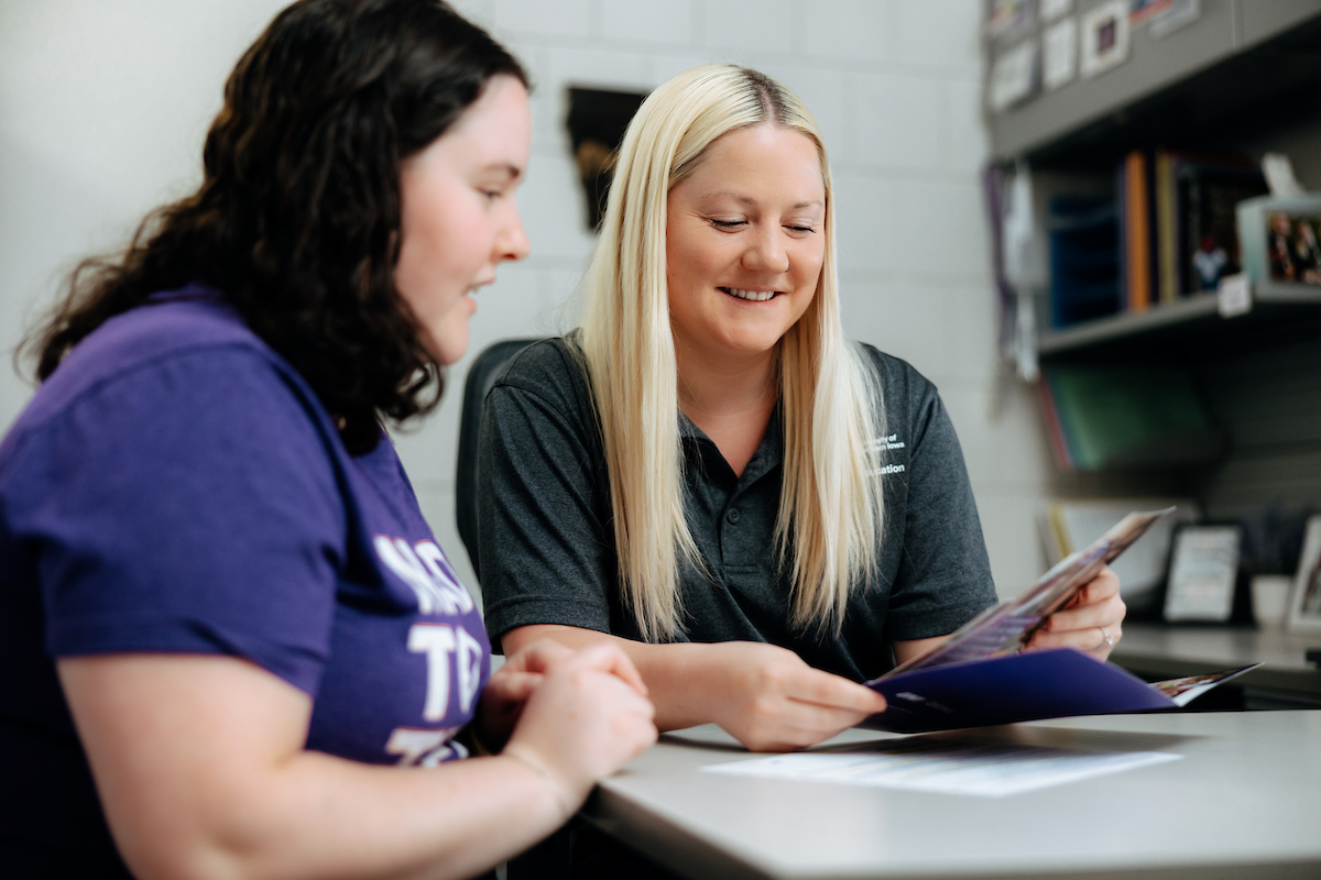 Amber Dullard working with student