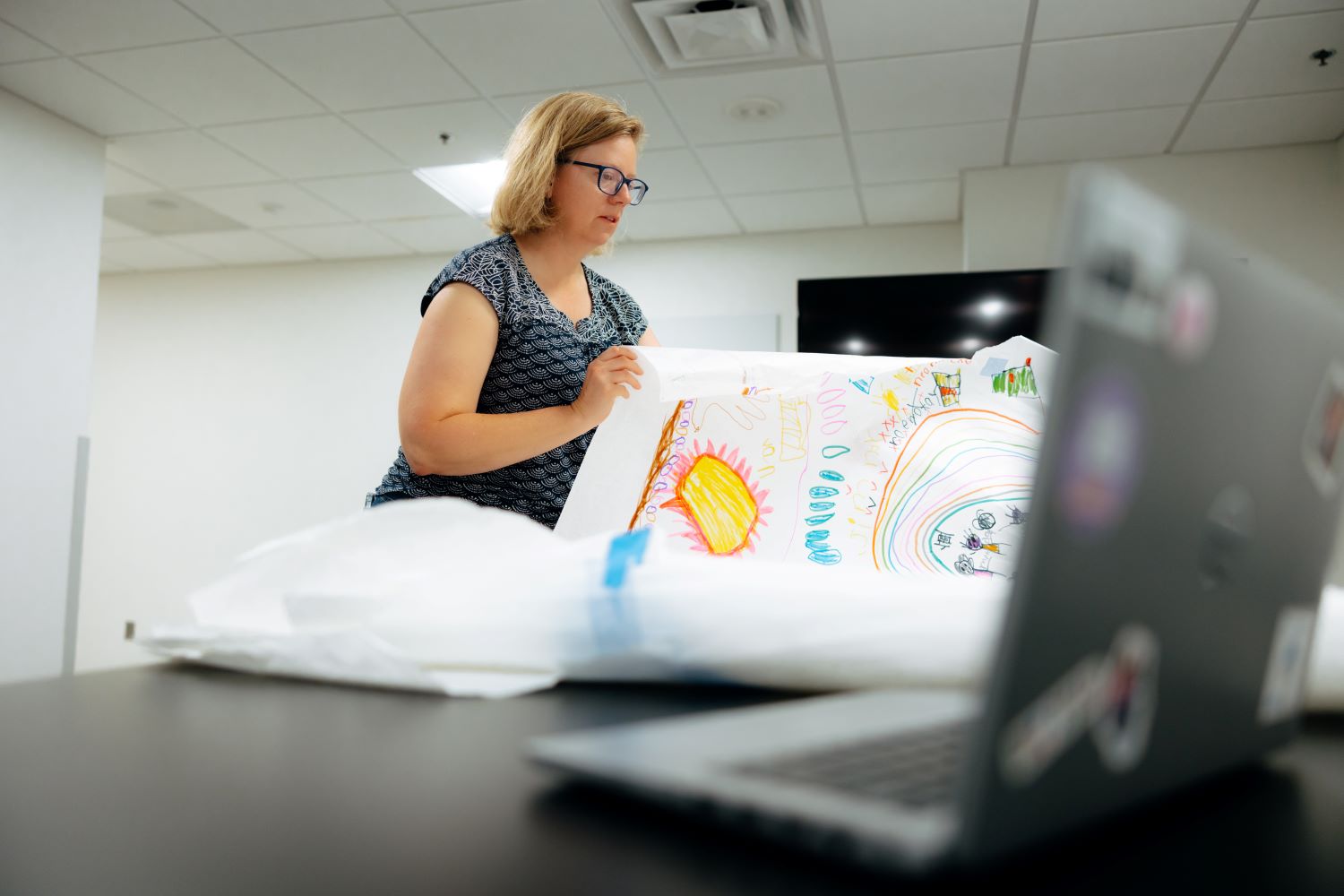 Sarah Vander Zanden working on 'Big Paper' project
