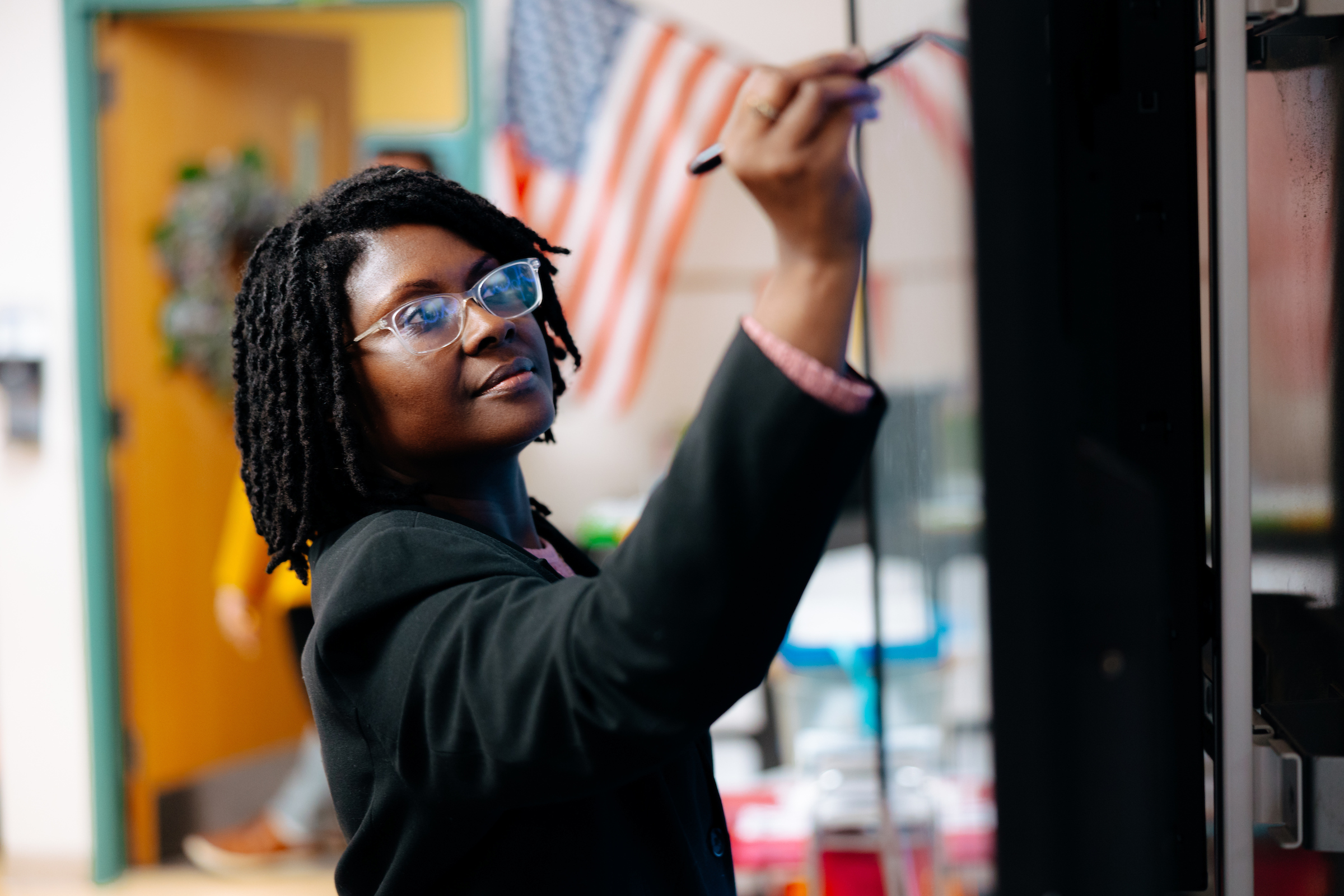 Student teacher at whiteboard