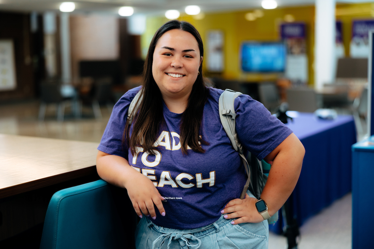 Student in Made to Teach t-shirt
