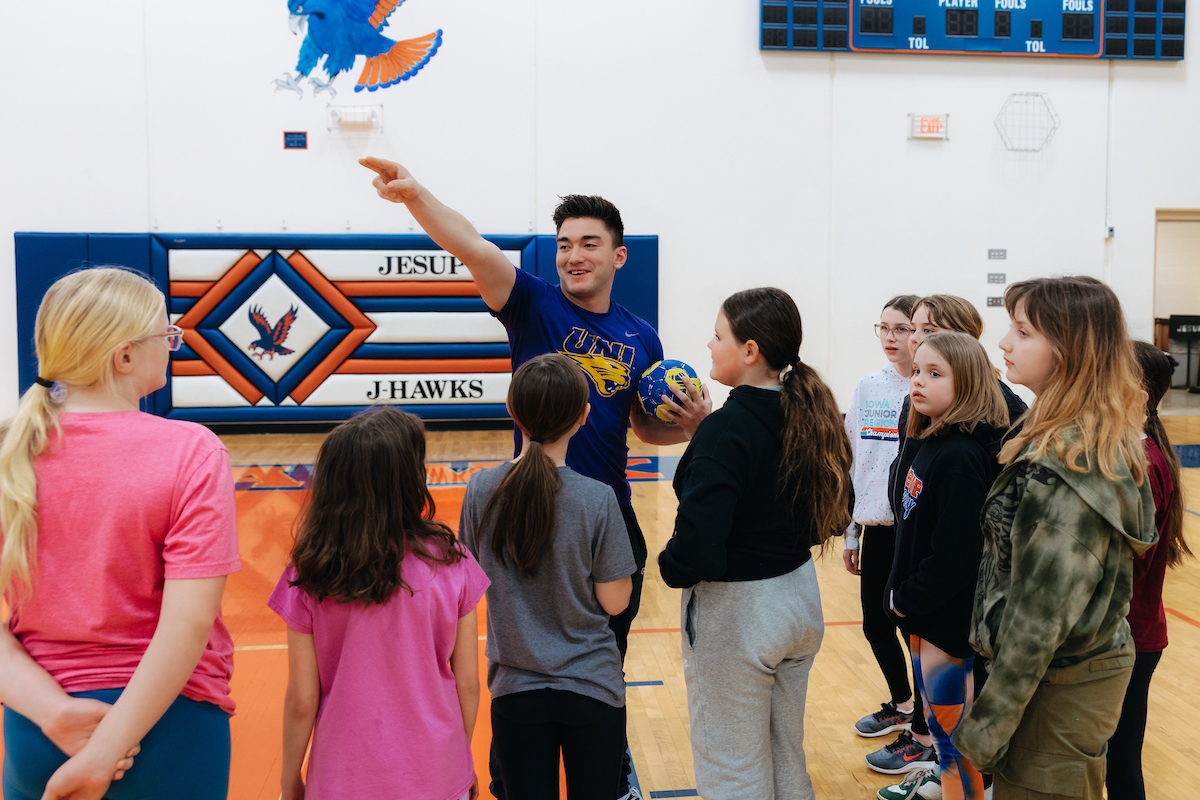 Student teacher in physical education class 