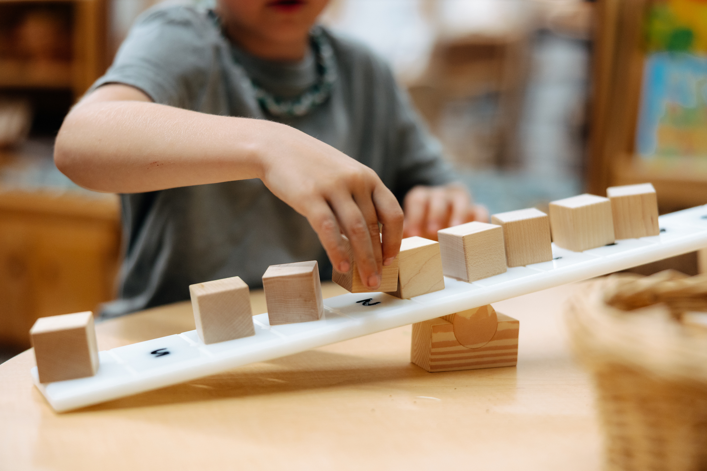 Balancing wood blocks on angle in STEM classroom
