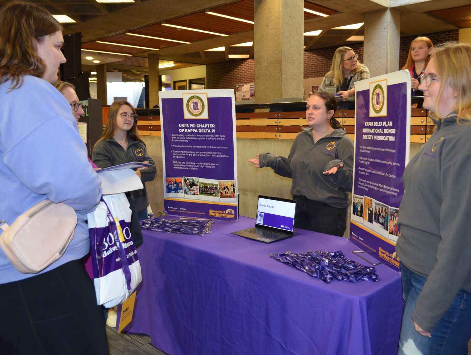 Kappa Delta Pi at browsing fair with students