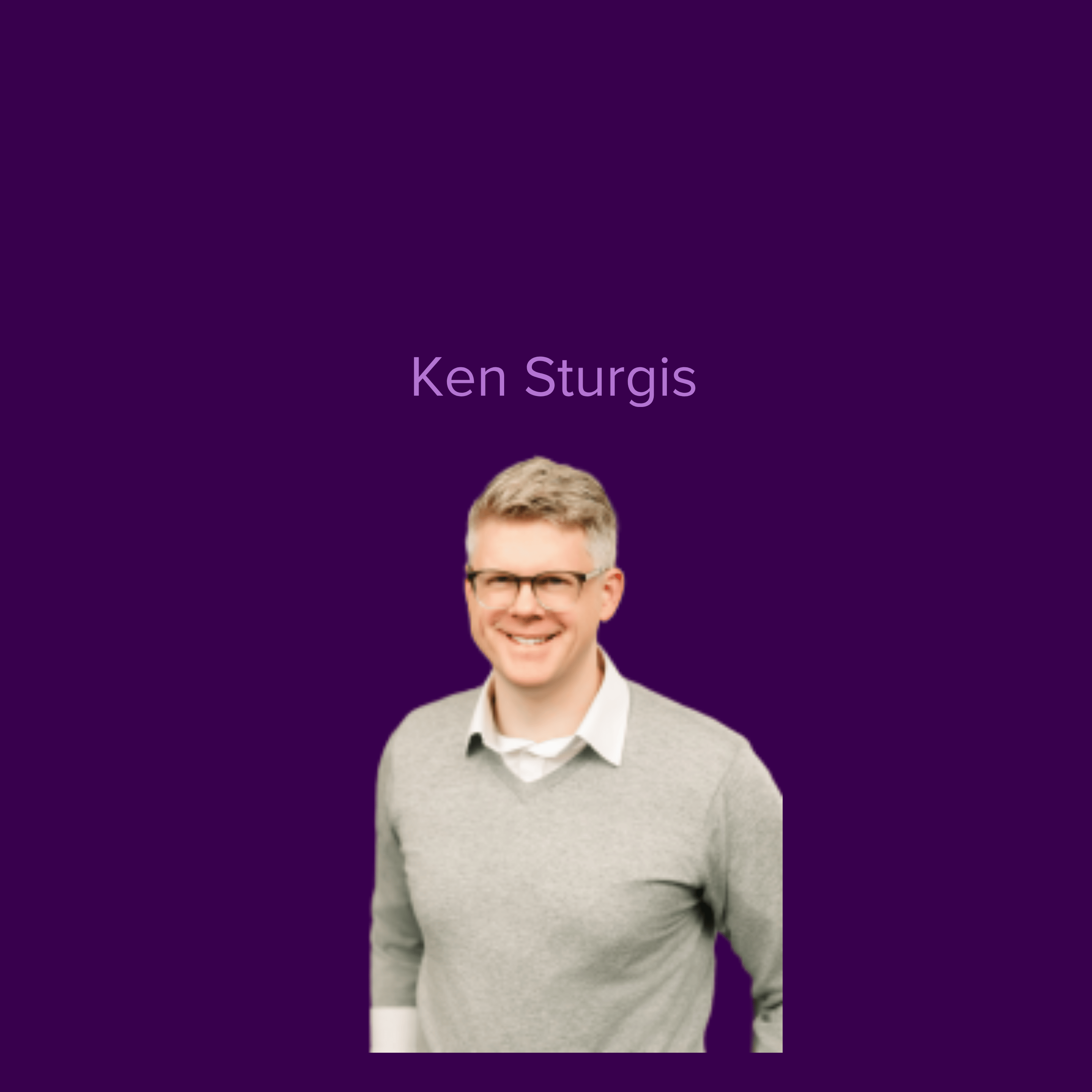 Image of smiling Ken Sturgis wearing a grey sweater and glasses