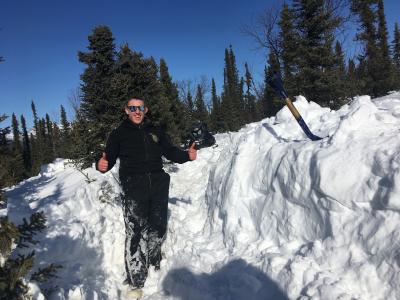 Sam Braband in a snow drift in Alaska
