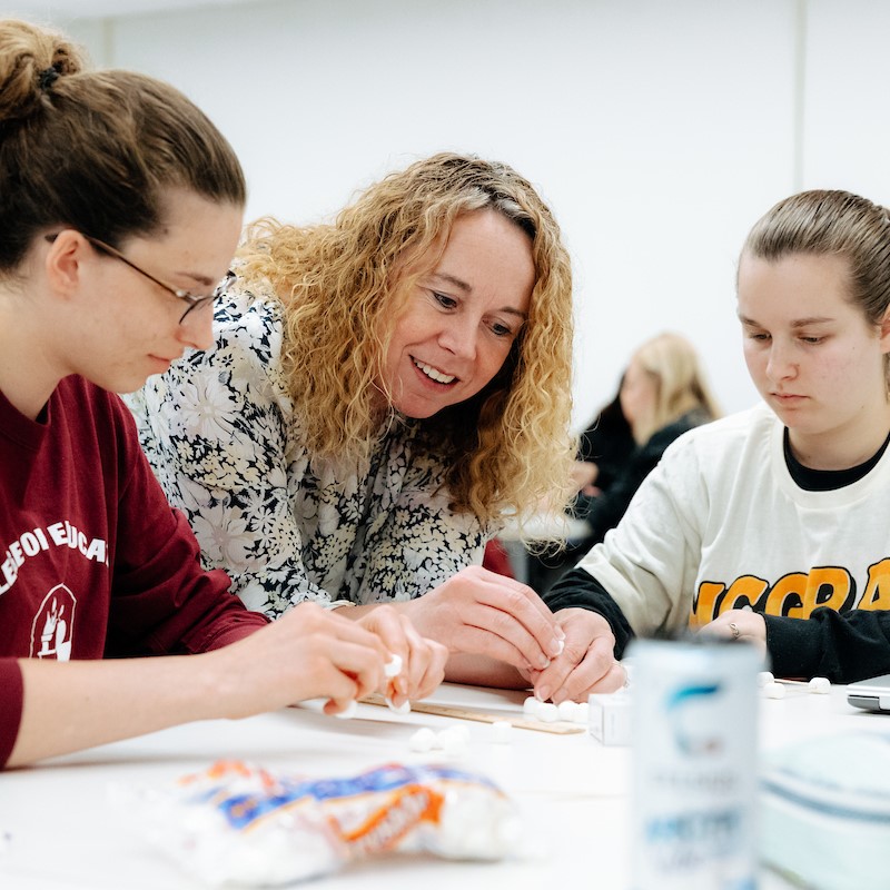 Allison Pattee working with students in class