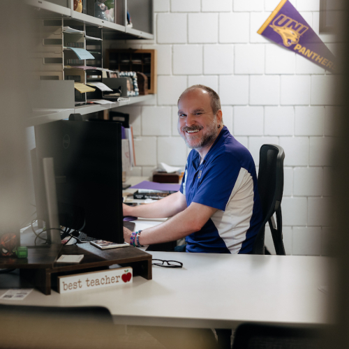 Advisor Mike Tate at his desk